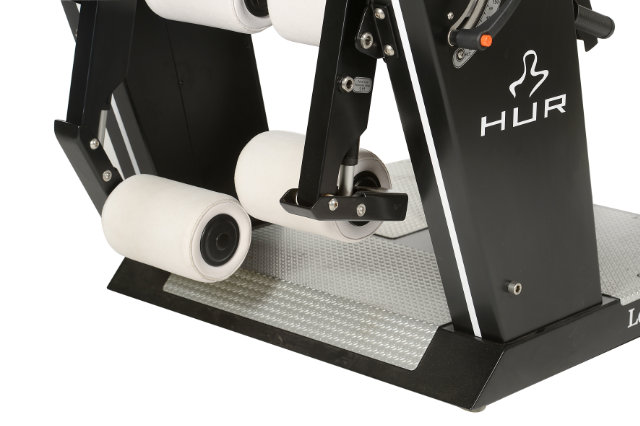 Gym machine Electrically adjustable lever arms