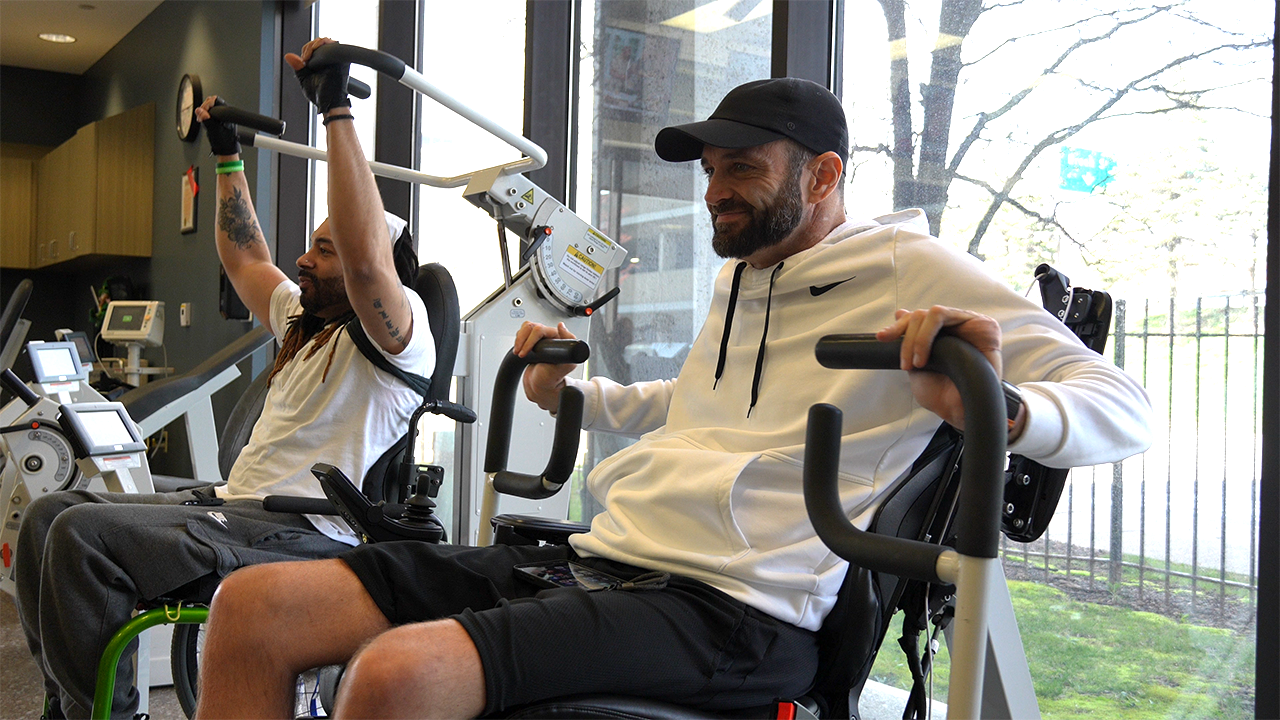 An interior view of the gym where people are training with HUR gym machines.