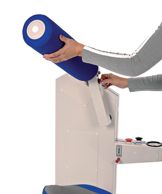 Close-up of reversible rollers on an abdomen/back training machine